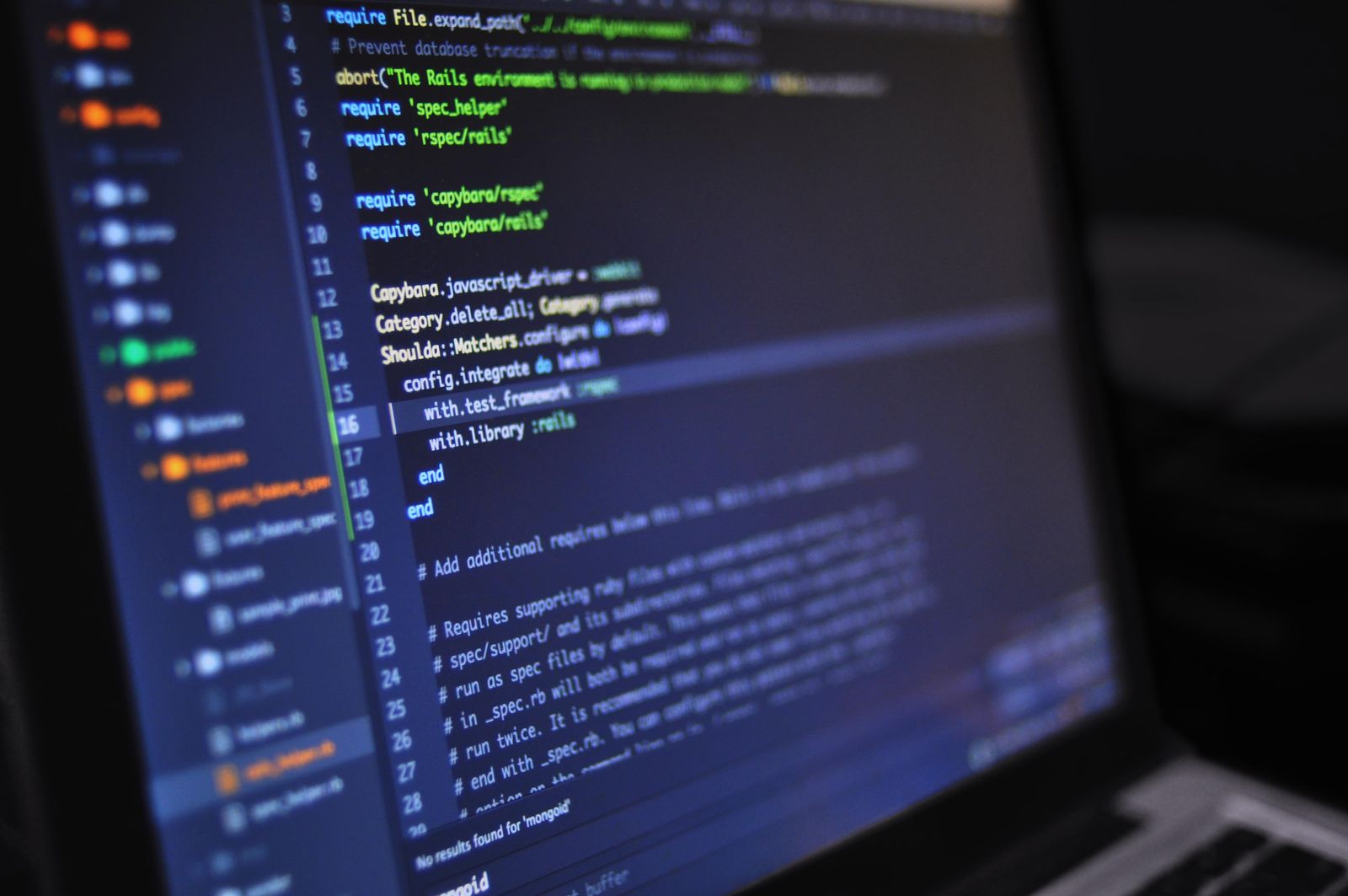 A close-up of a computer screen displaying code. Identifying the ransomware strain tells you whether a free decryptor exists for it.