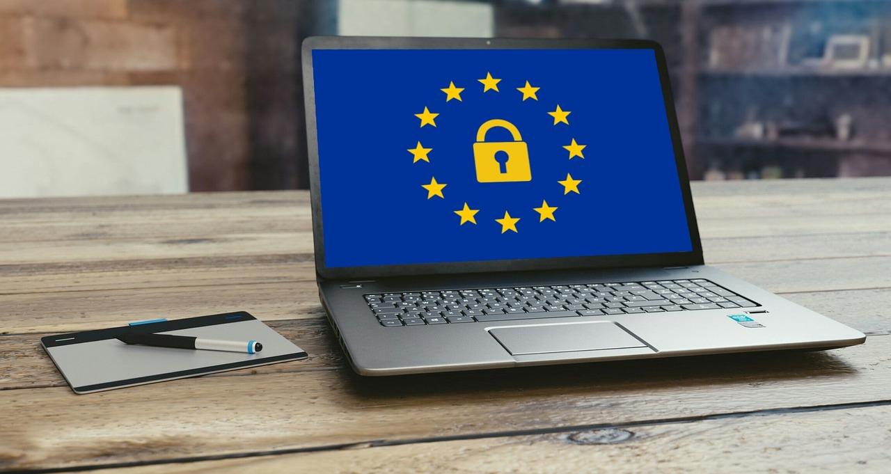 A laptop screen showing a padlock security icon.